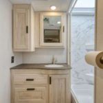 Cabover Style FS31 Slideout RV – 7 Berth Bathroom