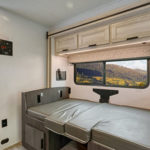 RB Class C 29-31 Motorhome – 7 Berth_Interior_dining_table_bed_built